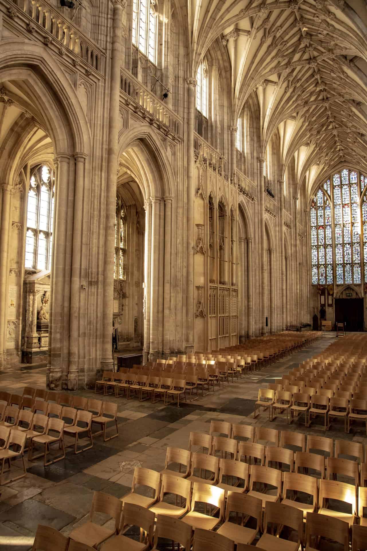 Winchester Cathedral nave 2023 featuring new seating and stain glass window