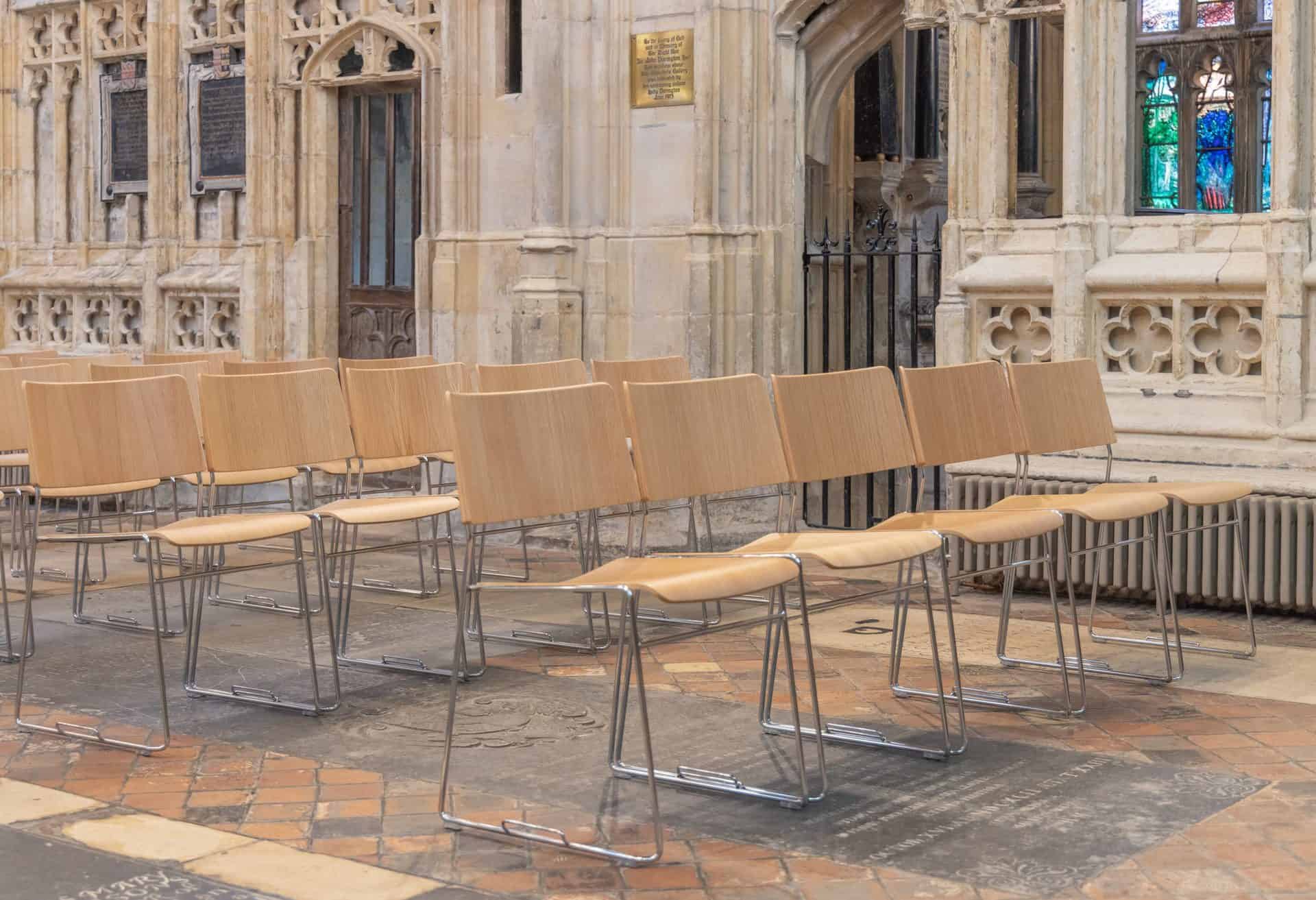 Rows of abbey chairs at gloucester cathedral